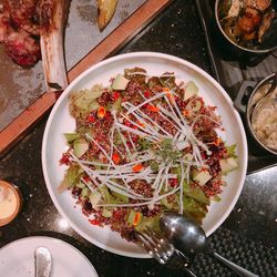 High angle view of salad in bowl on table