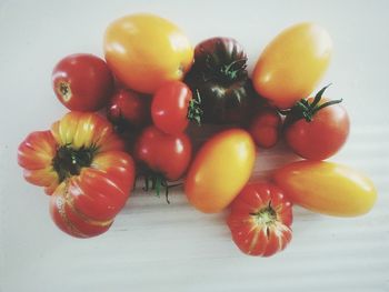 Close-up of fruits against white background