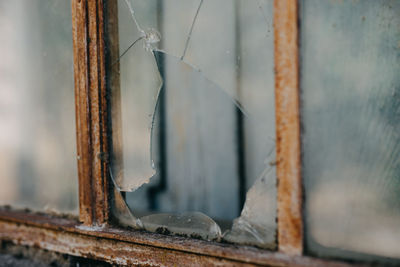 Close-up of broken window