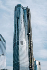 Low angle view of modern buildings against sky