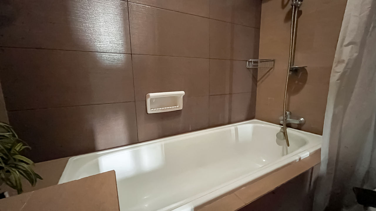 bathroom, domestic bathroom, home, domestic room, room, sink, indoors, bathtub, faucet, shower, hygiene, home interior, household equipment, mirror, tap, no people, flooring, tile, floor, bathroom sink, luxury, wealth, architecture, house, apartment, home showcase interior, plumbing fixture