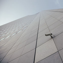 Low angle view of modern building against clear sky