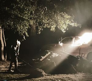 Man on field at night