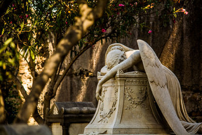 Close-up of statue against trees