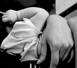 Close-up of woman hand with tattoo