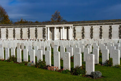 Panoramic shot of cemetery against sky