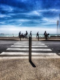 Man against cloudy sky