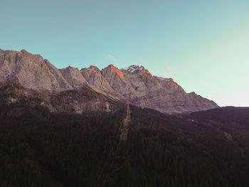 Colorful landscape with mountais and lake at golden hour