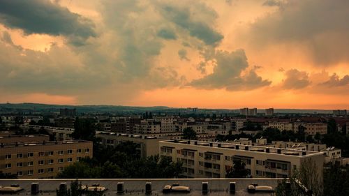High angle view of townscape against sky at sunset