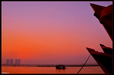 Scenic view of sea at sunset