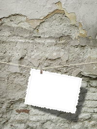 Close-up of hanging from wall