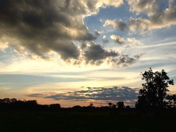 Scenic view of silhouette landscape against sky during sunset