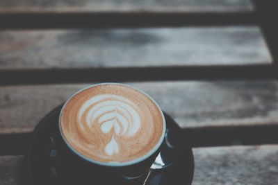 Close-up of cappuccino on table