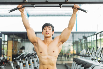 Man exercising in gym