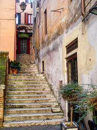 Alley amidst buildings in city