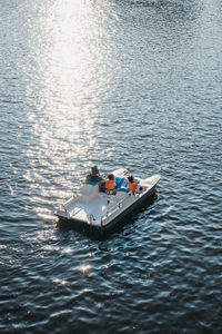 High angle view of people in boat at sea