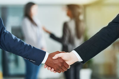 Business people shaking hands