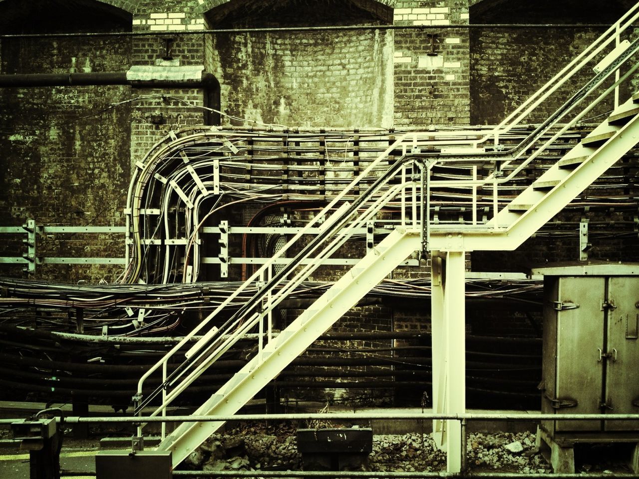 architecture, built structure, abandoned, indoors, old, staircase, steps, steps and staircases, railing, damaged, obsolete, run-down, metal, deterioration, low angle view, building exterior, weathered, ruined, bad condition, building