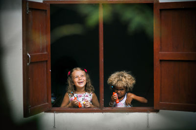 Portrait of smiling girl indoors