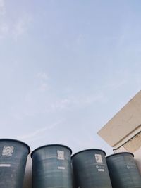 Low angle view of smoke stack against sky