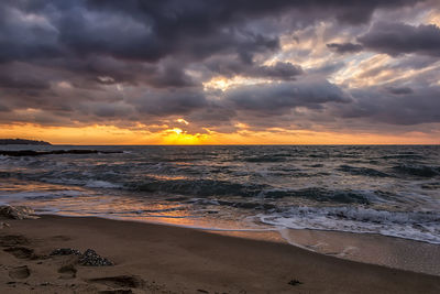 Scenic view of sea against sky during sunset