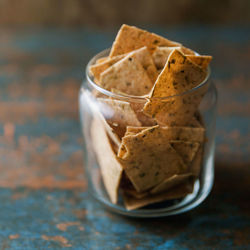 Close-up of ice cream in glass jar on table