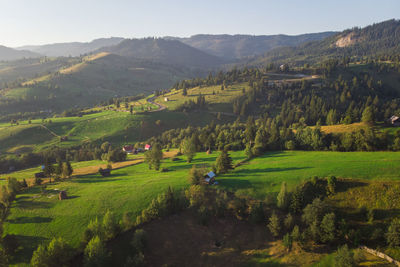 Scenic view of agricultural field against mountains