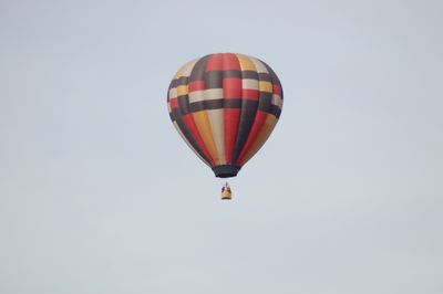 Low angle view of hot air balloon against clear sky