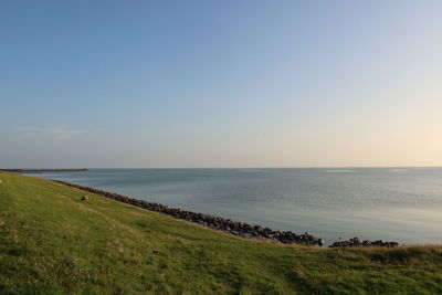 Scenic view of sea against clear sky