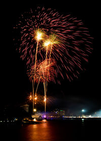 Firework display at night