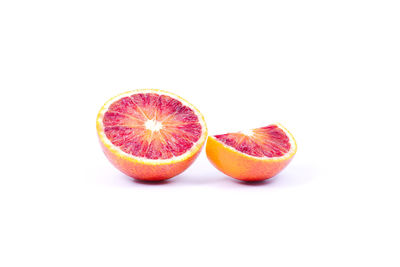 Close-up of fruits against white background