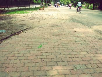 Footpath on cobblestone street