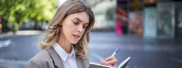 Young woman using mobile phone