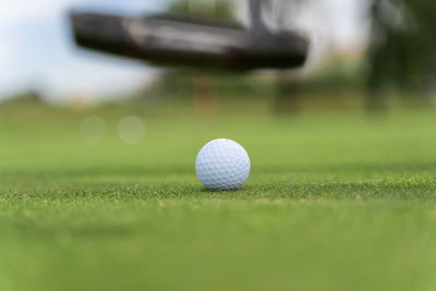 Close-up of ball on grassland