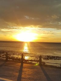 Scenic view of sea at sunset