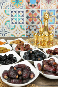 Close-up of fruits in plate on table