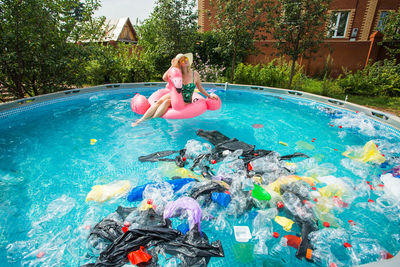 Woman swimming in pool