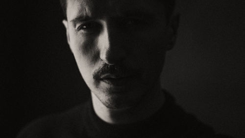 Portrait of a man with a mustache, close-up. mood