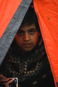 Portrait of young woman looking down