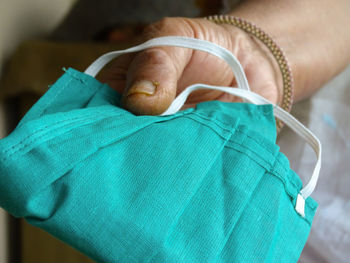 Close-up of woman holding hands