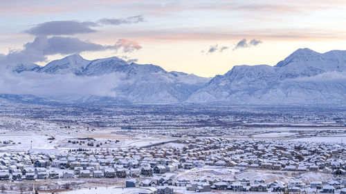 Scenic view of snowcapped mountains against sky