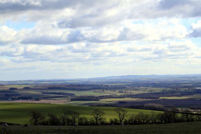 View of landscape against cloudy sky