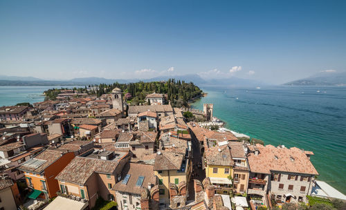 High angle view of buildings amidst sea