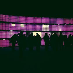 Blurred motion of woman at night