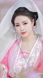 Young asian woman wearing pink hanfu