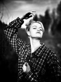Portrait of young woman looking away