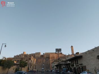 Low angle view of buildings against clear sky