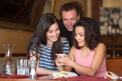 Woman sitting in restaurant