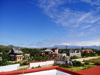 High angle view of town against cloudy sky