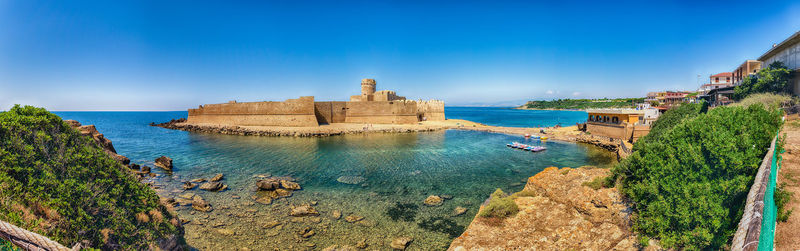 High angle view of fort against blue sky